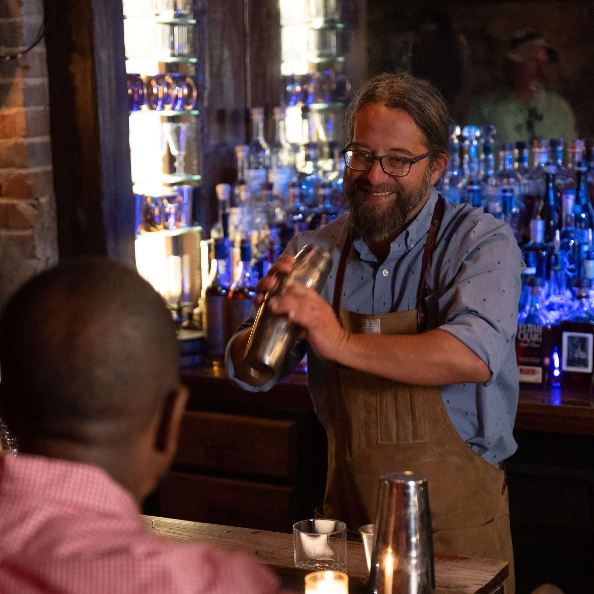 Bartender shaking a drink
