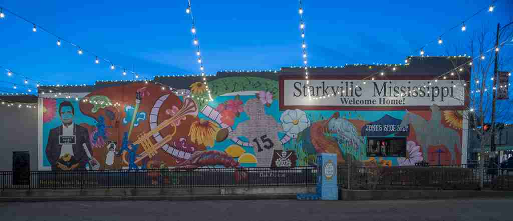 Starkville, Mississippi, wall mural showcasing Johnny Cash's arrest photo